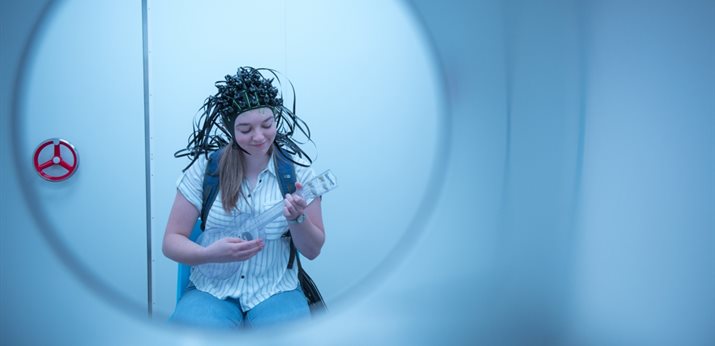 Playing ukelele with MEG scanner