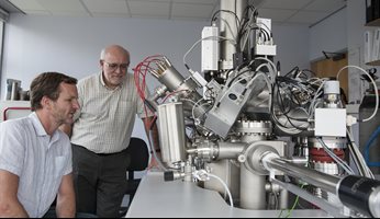 Morgan Alexander and Paul Williams with OrbiSIMS Facility